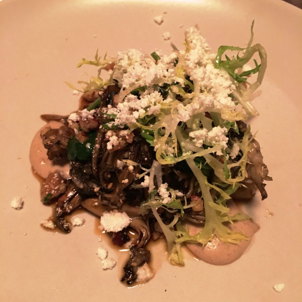 ROASTED MUSHROOMS with bitter greens, fresh herbs, cheese 