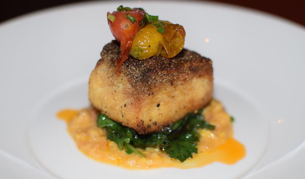 Cornmeal crusted Maryland rockfish with bacon creamed corn, sautéed baby kale, baby heirloom tomatoes and Old Bay oil. Although we enjoyed this small taster, the rockfish is normally offered as a full-size entree.